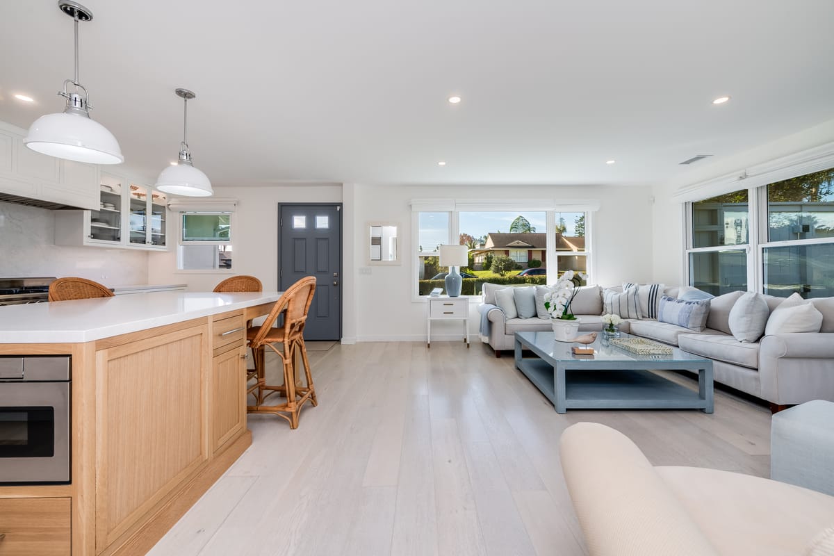 Open-plan kitchen and great room in a Santa Barbara home remodeled by Horst Construction